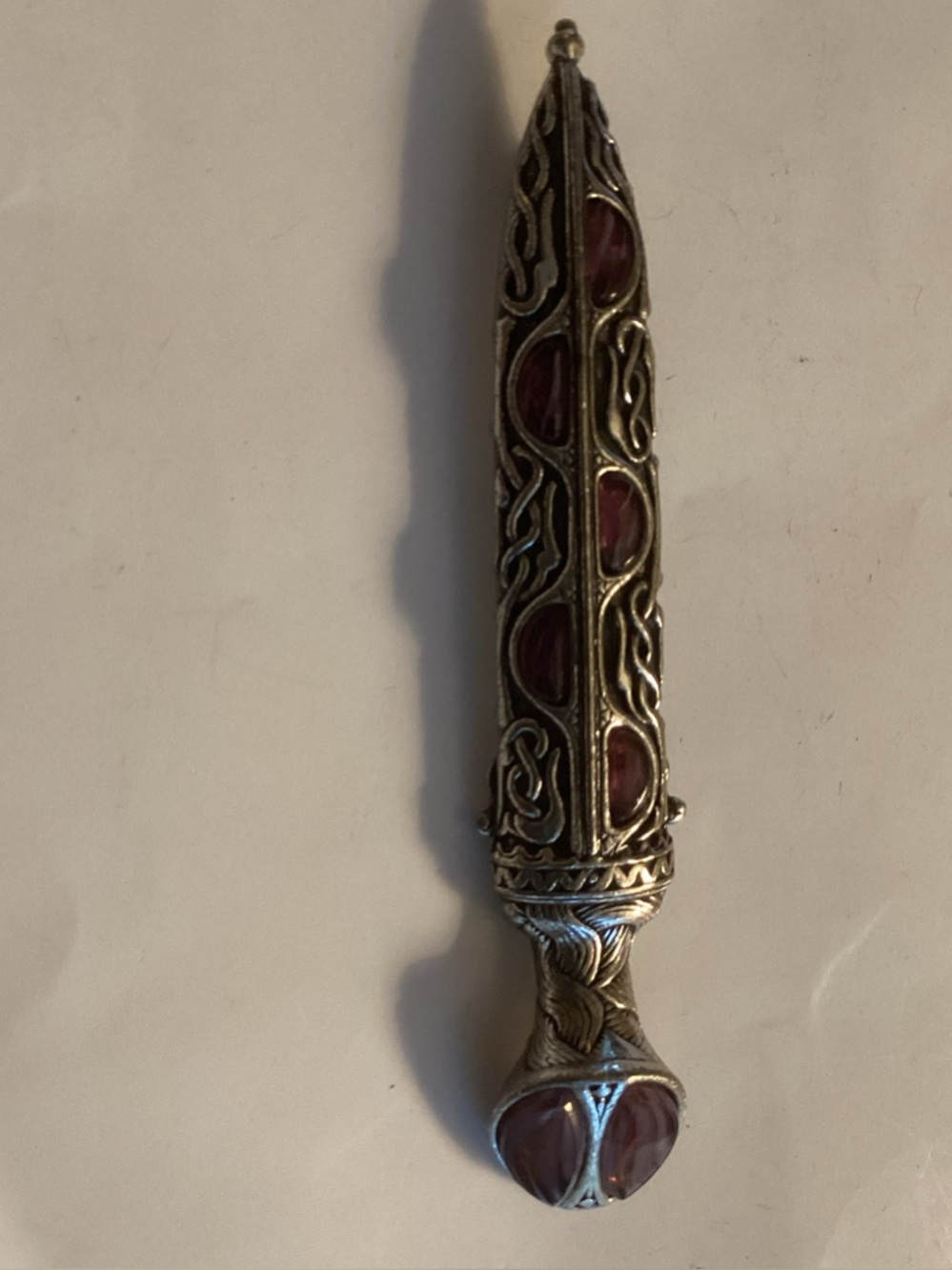 Ornate Silver-Tone Decorative Dagger Pendant with Amethyst inlays.